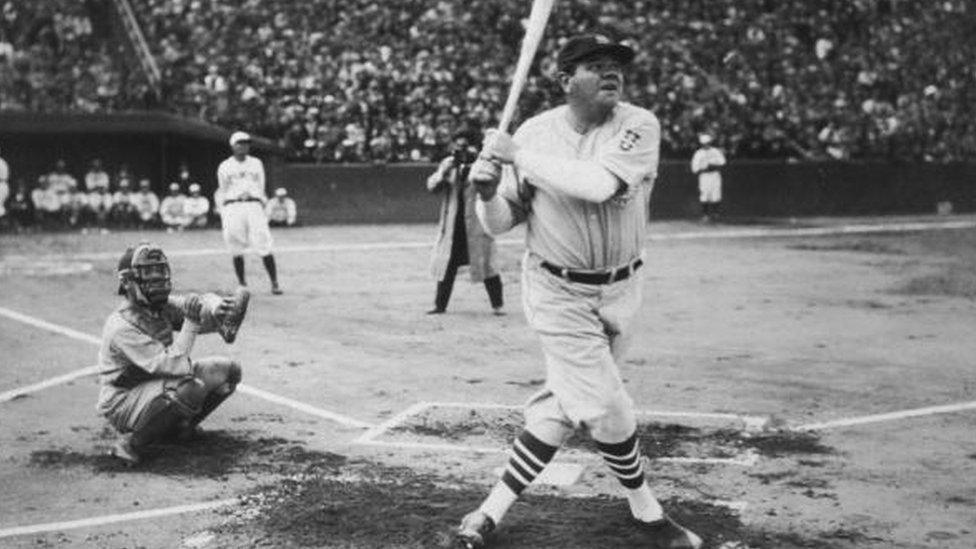 Babe Ruth hits his first home run during his tour of Japan at Miji Shrine Stadium, Tokyo, Japan