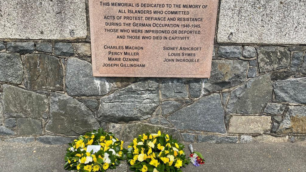 Memorial with Joseph Gillingham's name and flowers below