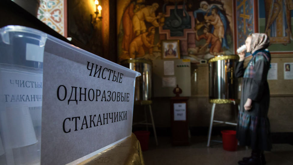 Disposable cups at St George Cathedral, Yugra, Russia, March 2020