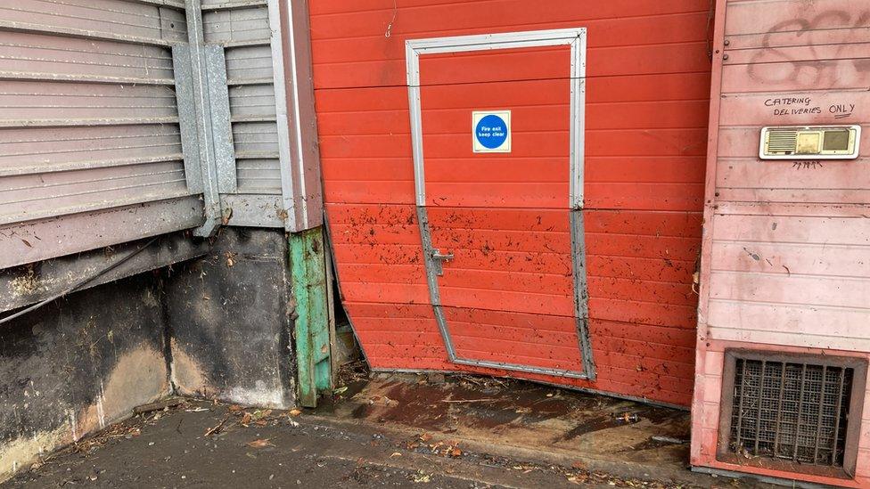 Link Centre door damaged by water