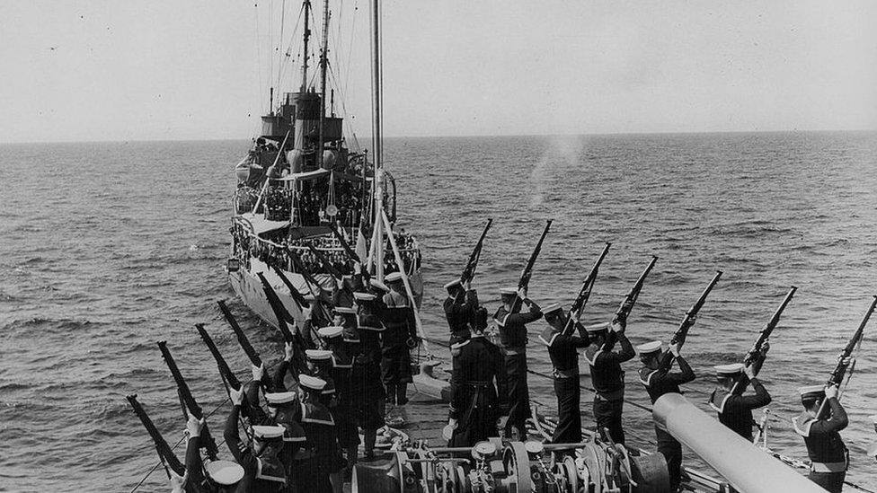 A military gun salute for the loss of HMS Thetis in Liverpool Bay in 1939