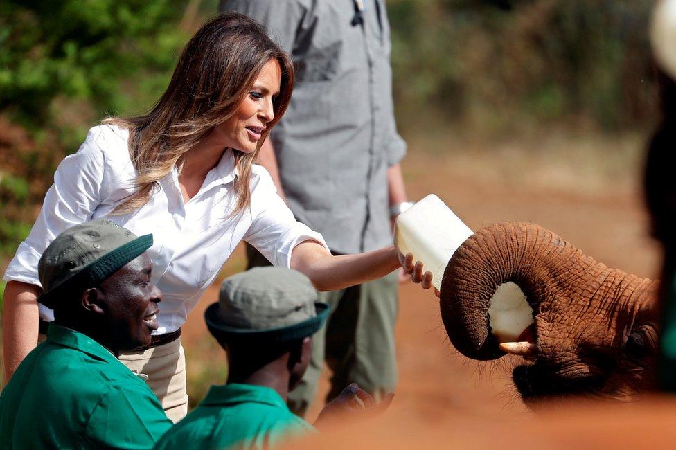 U.S. first lady Melania Trump feeds a baby elephant a bottle of milk at the David Sheldrick Wildlife Trust elephant orphanage in Nairobi, Kenya, October 5, 2018.