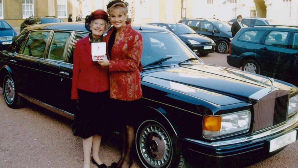 Angela Rippon with her mother at Buckingham Palace in 2005 receiving her OBE