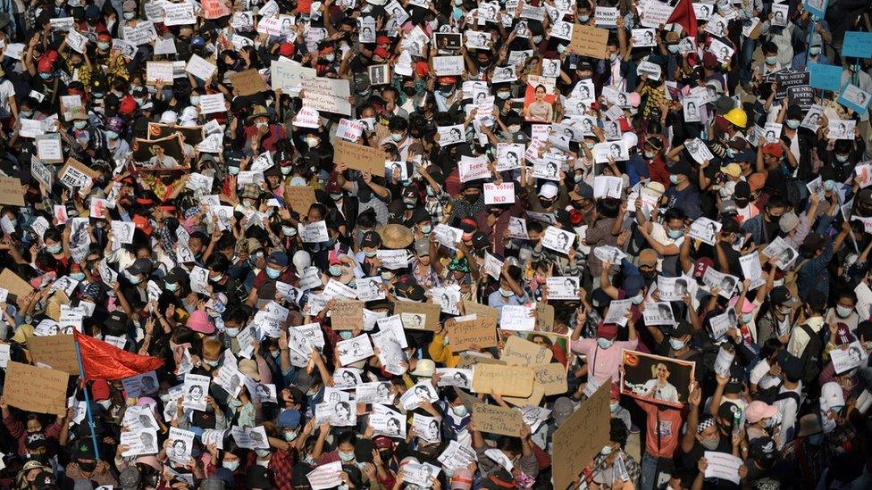 People join a rally against the military coup and to demand the release of elected leader Aung San Suu Kyi, in Yangon, Myanmar, February 9, 2021