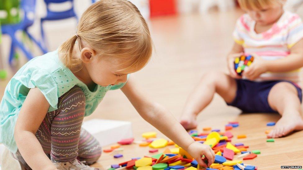 Child playing with toys