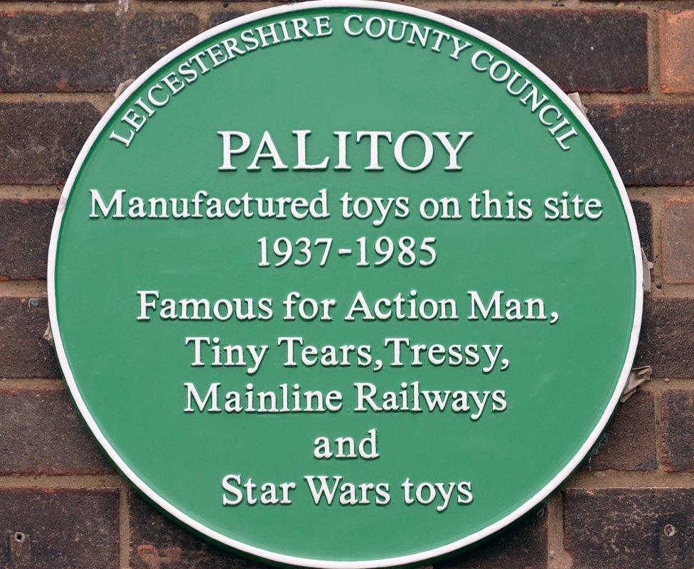 Green plaque