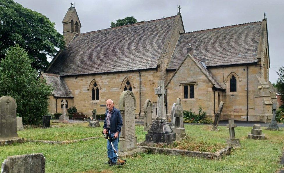 Church warden Tom Laidler in the overgrown churchyard at St Matthew's Church in Dinnington