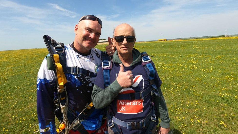 Mark Pile and his skydiving instructor