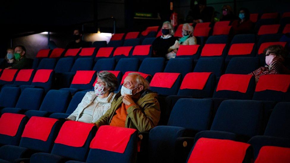 Cinema audiences watch Nomadland inside a movie theatre screen at Chapter, Cardiff, as indoor hospitality and entertainment venues reopen to the public following the further easing of lockdown restrictions in Wales.