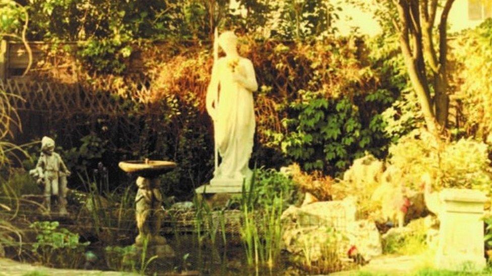 Aphrodite statue in garden