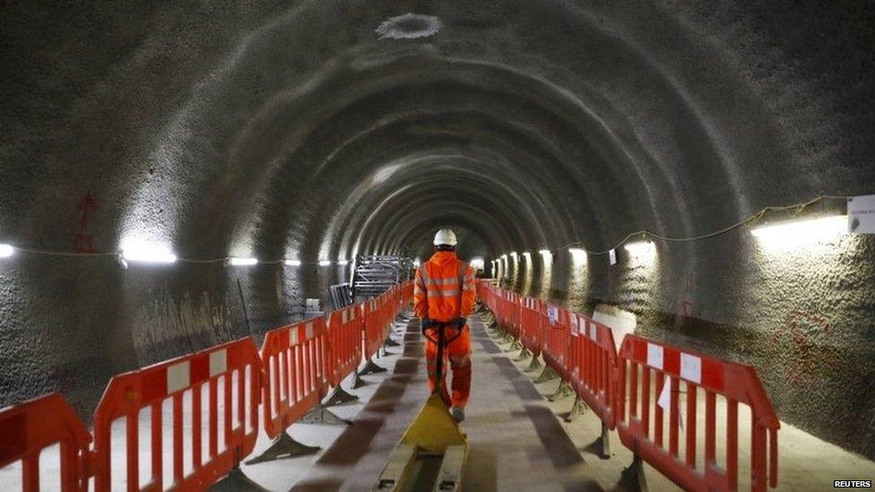 Engineer in tunnel on the Crossrail network