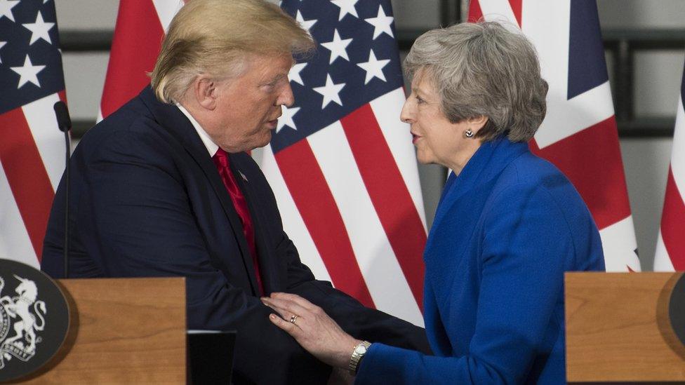 Donald Trump and Theresa May shake hands during a joint press conference