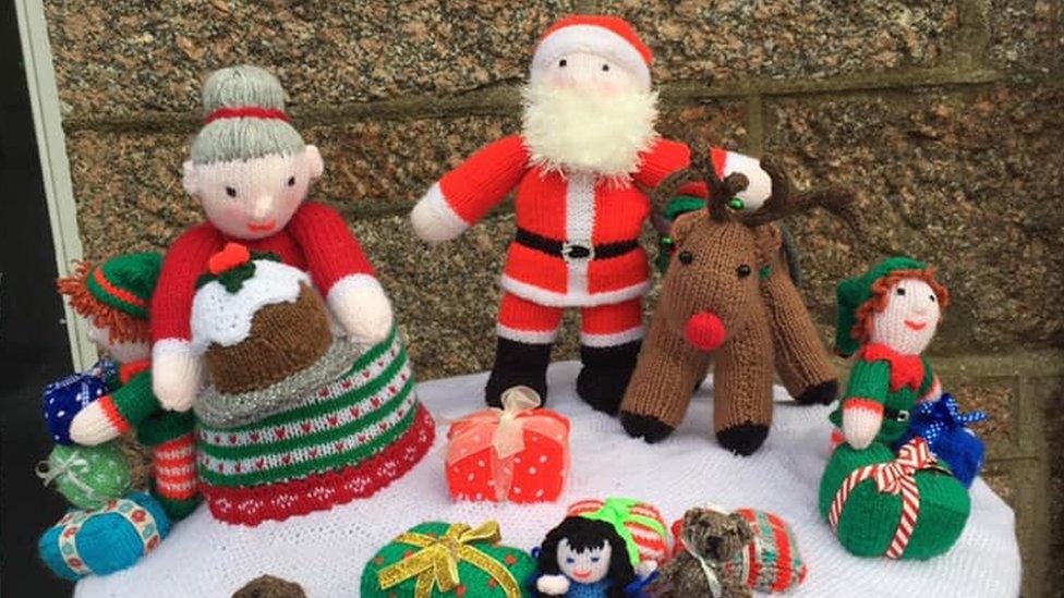 Post box topper with Santa and Mrs Claus