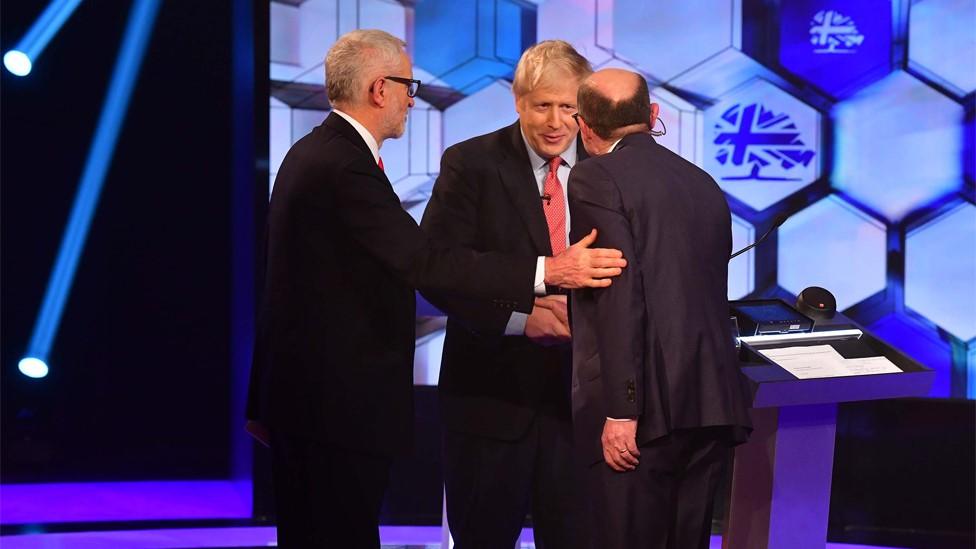 Jeremy Corbyn, Boris Johnson and moderator Nick Robinson