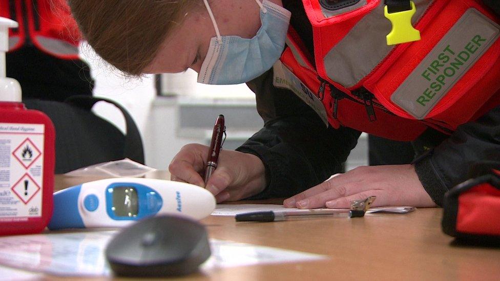 Volunteer logs her equipment