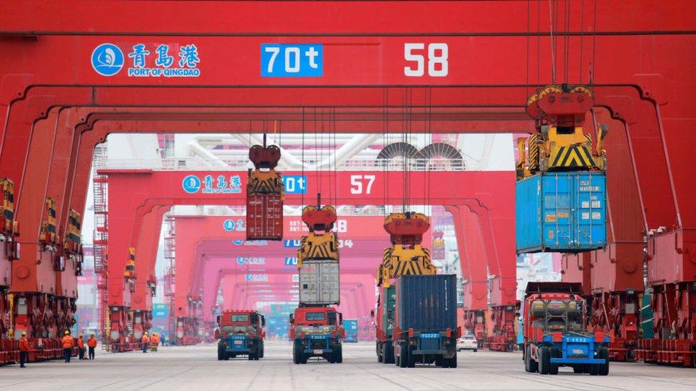 Containers are unloaded at Qingdao Port