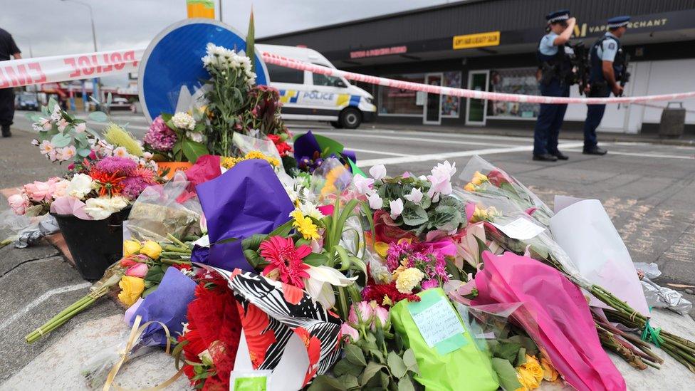 Flowers laid at police cordon near scene of shooting in Christchurch on 15 March 2019