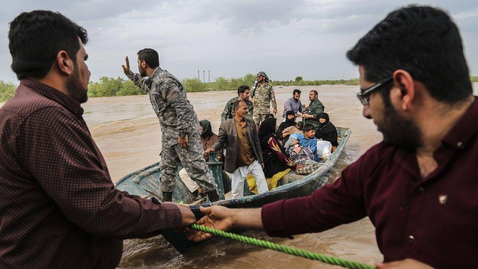 Iranian soldiers help evacuate civilians amid unprecedented flooding, March 2019