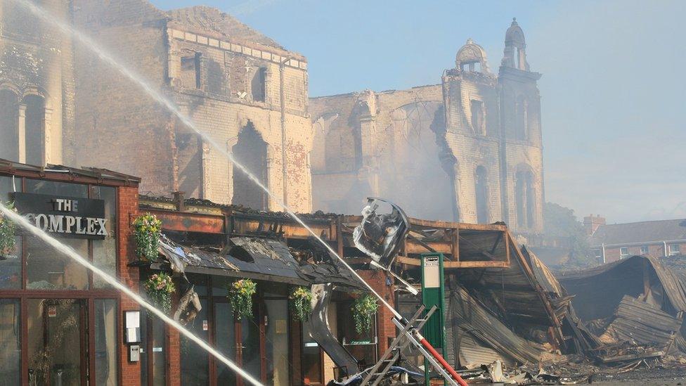Complex building in aftermath of blaze