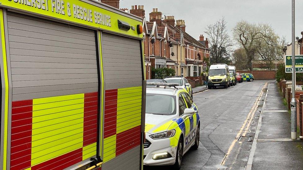 A fire engine and police cars in Abingdon Street