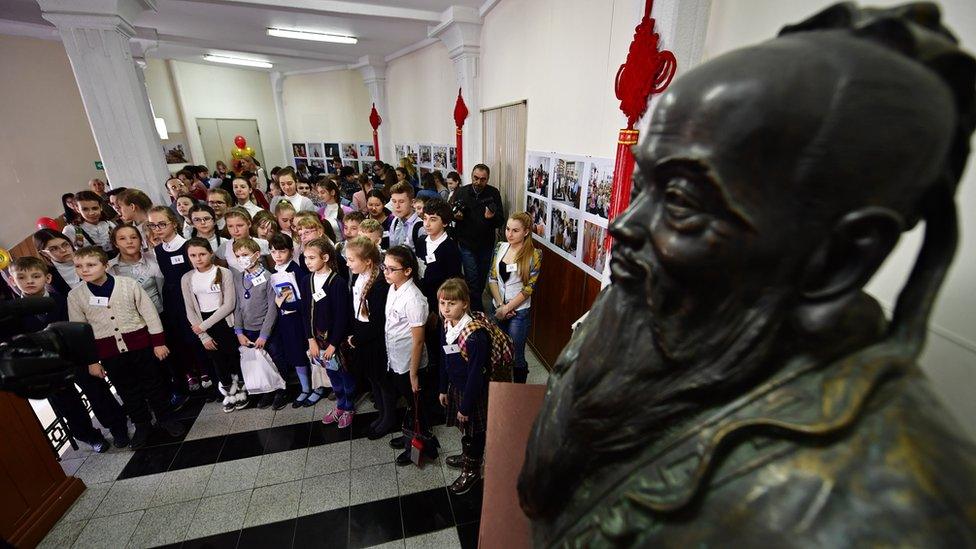 A statue of Confucius at one of the institutes