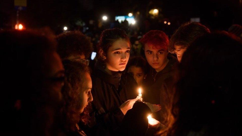 People at a vigil in Pittsburgh's Squirrel Hill