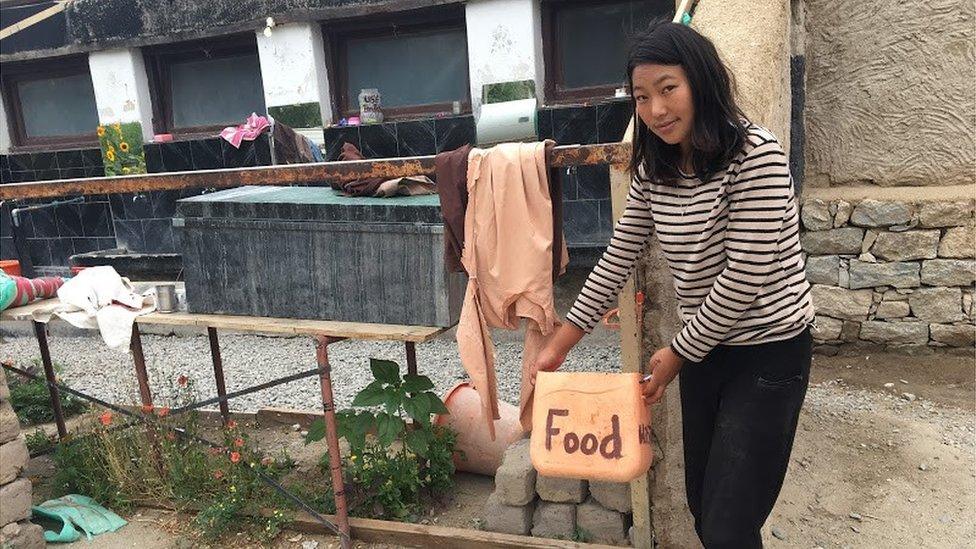 Padma Dolma shows food box