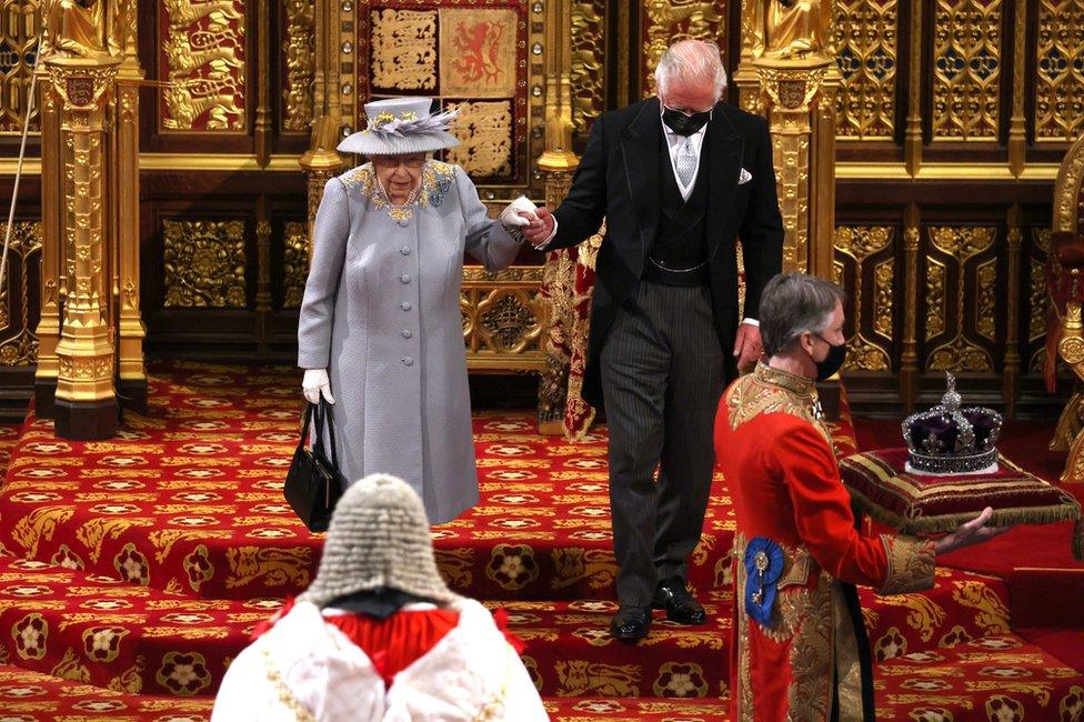 Queen Elizabeth II leaves the House of Lords after delivering the Queen's Speech