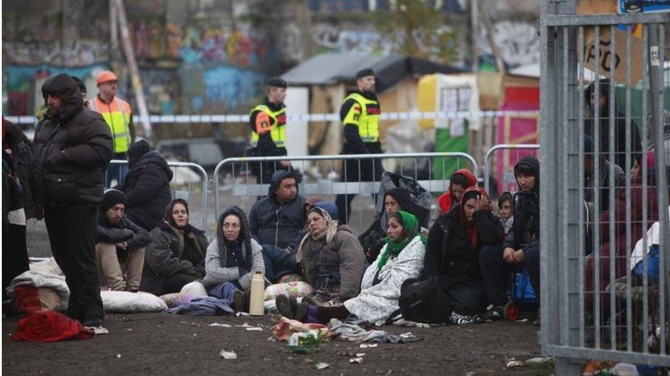 Swedish police evict migrants from a illegal camp in Malmoe, Sweden, on 3 November 2015.