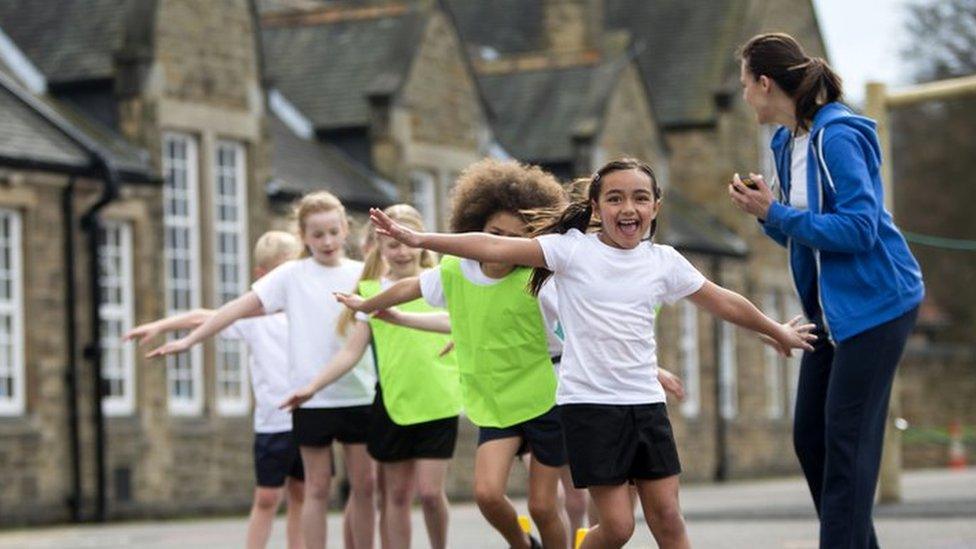 Children playing in PE Kit