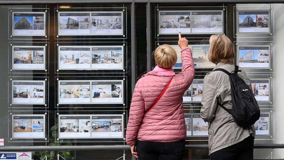 people looking at property for sale