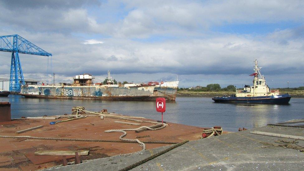 The Tuxedo Royale is ferried away