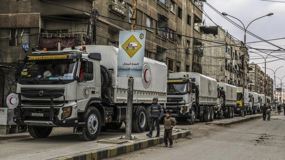 Humanitarian convoy enters Nashabiya, in the besieged rebel-held Eastern Ghouta, on 14 February 2018