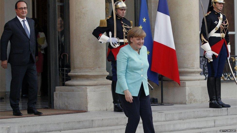 President Francois Hollande says goodbye to Chancellor Merkel at the Elysee Palace on 6 July