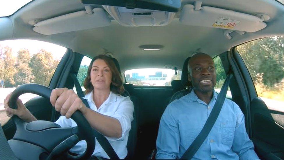 Suzi Perry and Ortis Deley in a car on a Smart Motorway