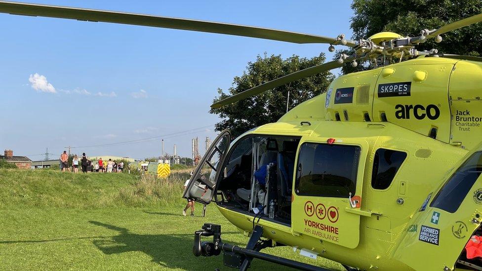 Helicopter and ambulance at scene