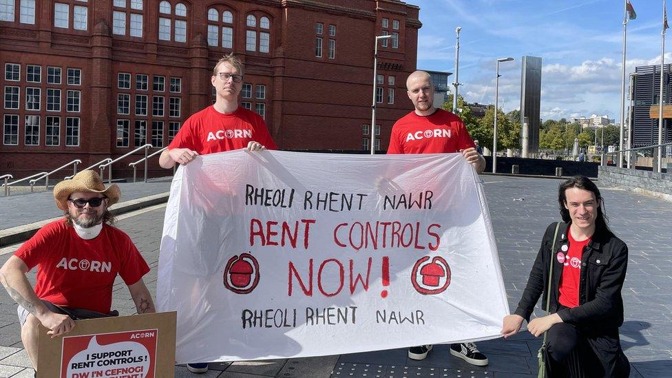 Members of Acorn Cardiff outside the Senedd