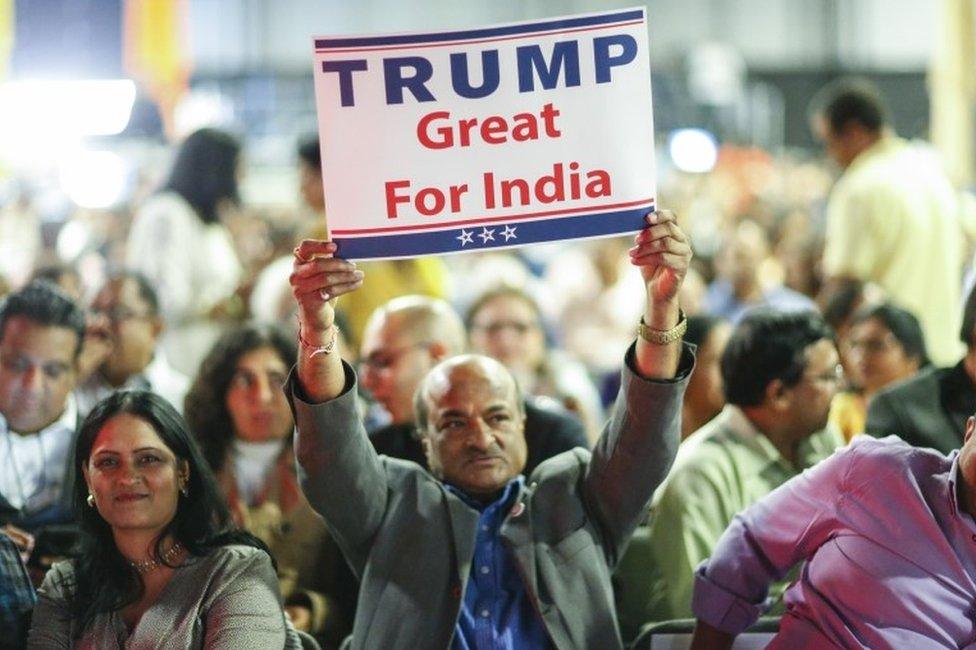 Republican presidential candidate Donald Trump supporters listens as he speaks during the Republican Hindu Coalition"s Humanity United Against Terror Charity event on October 15, 2016 at the New Jersey Convention ^ Expo Center in Edison, New Jersey.