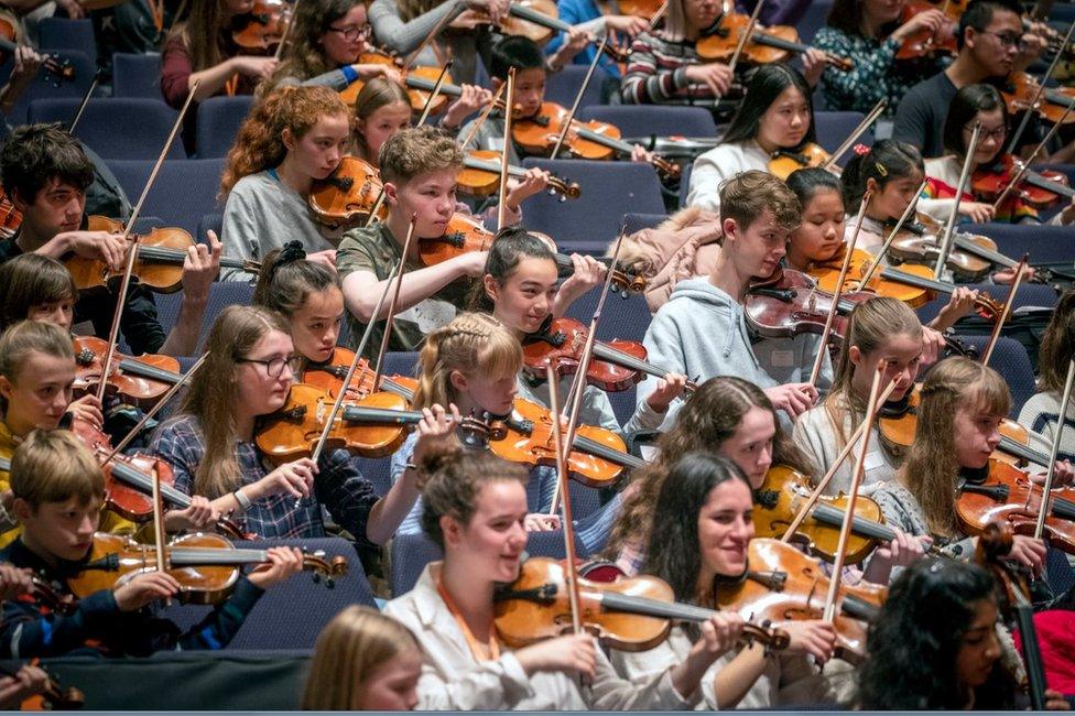 Violinist Nicola Benedetti performs with the Benedetti Foundation tutors and ambassadors for 350 young musicians at the first Benedetti Sessions at the Royal Concert Hall, Glasgow.