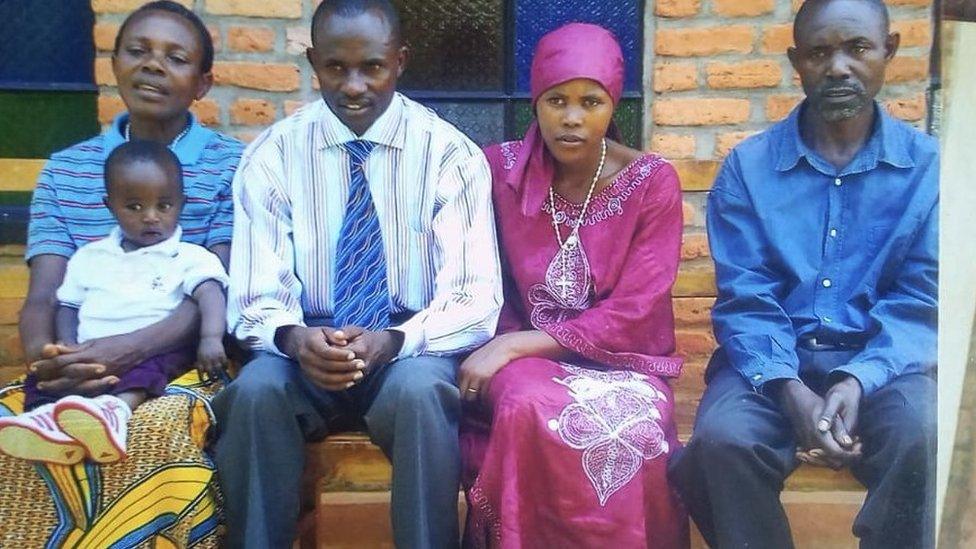 Bernadette (far left) holds her grandson, next to her is Alfred and Yankurije then far right is Gratien