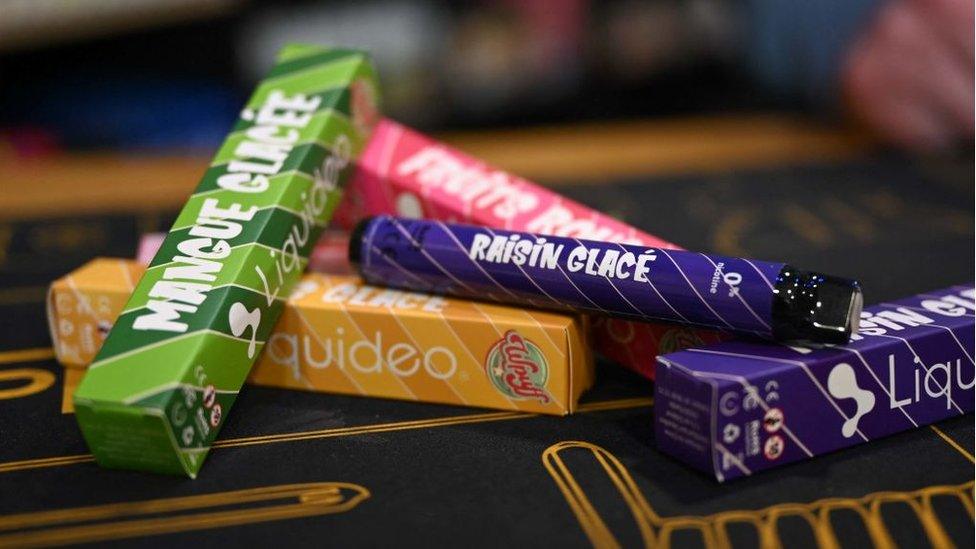 Boxes of "puffs" disposable electronic cigarettes displayed on table at a store in Bethune, northern France, on 25 May 2022.