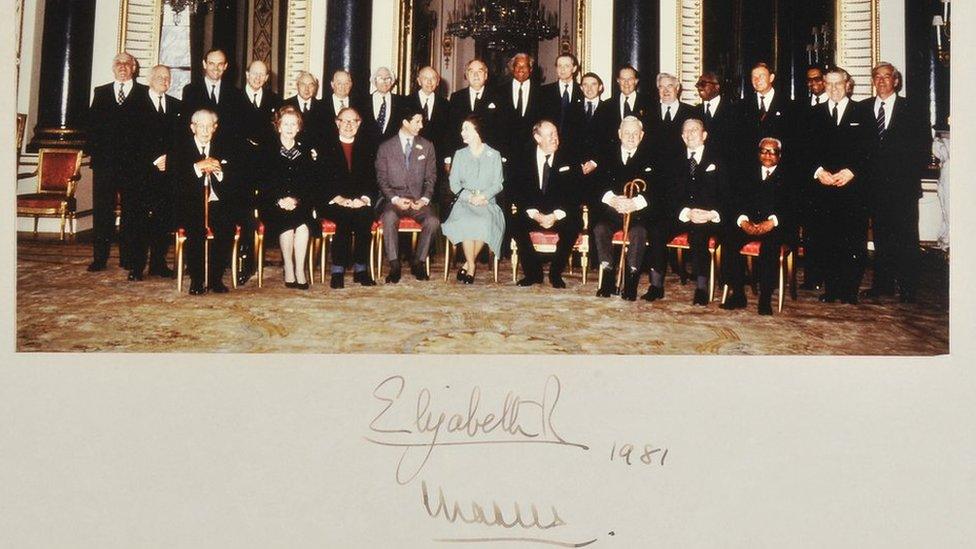 An official colour photograph of the Queen and Prince Charles with members of the Privy Council after a meeting at Buckingham Palace on 27 March 1981