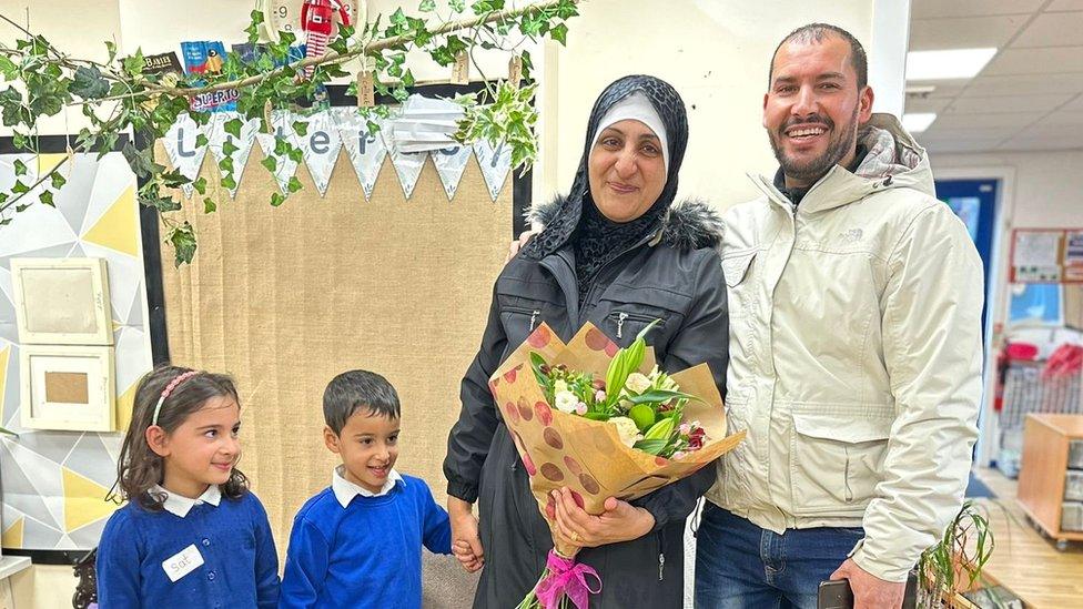 Islam Alashi and Feiz Chihaoui with their twins