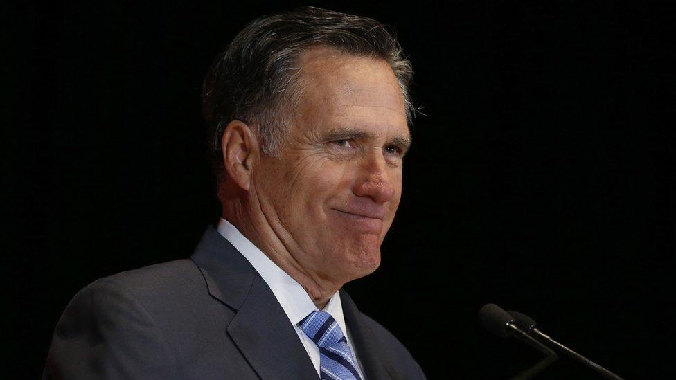 Mitt Romney smiles during a speech in Utah.