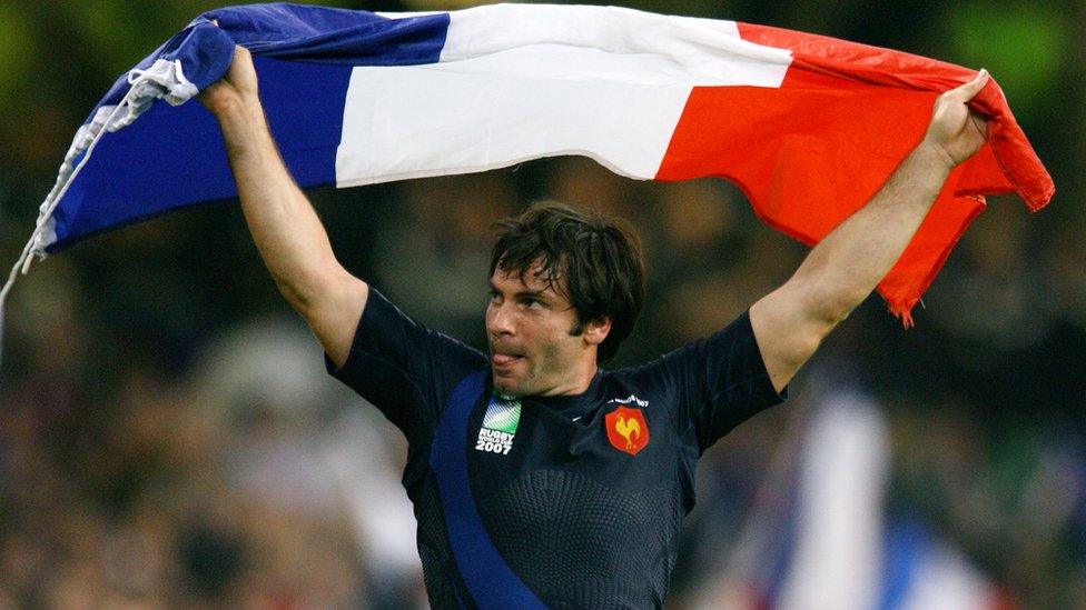 France's Christophe Dominici celebrates after the quarter-final Rugby World Cup match against New Zealand in Cardiff October 6, 2007