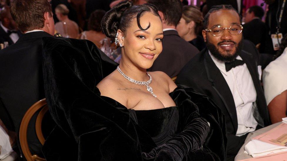 Rihanna pictured at January's Golden Globes with Black Panther director Ryan Coogler