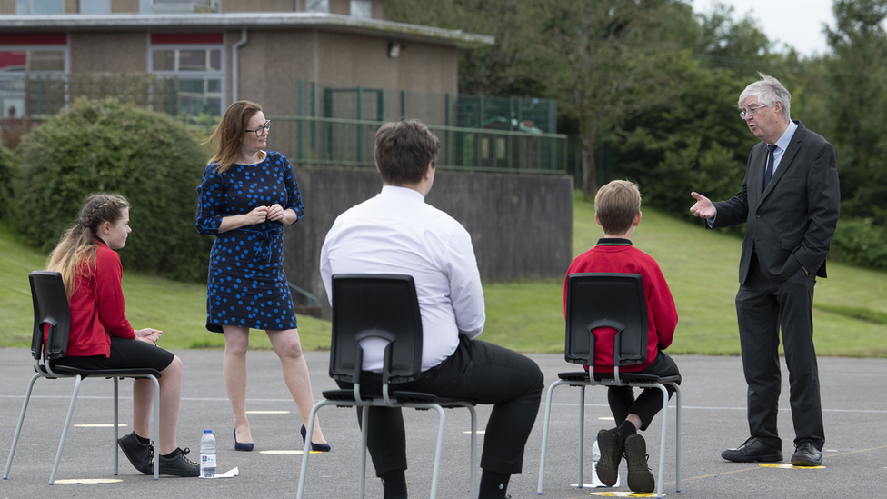 Drakeford with pupils during Covid