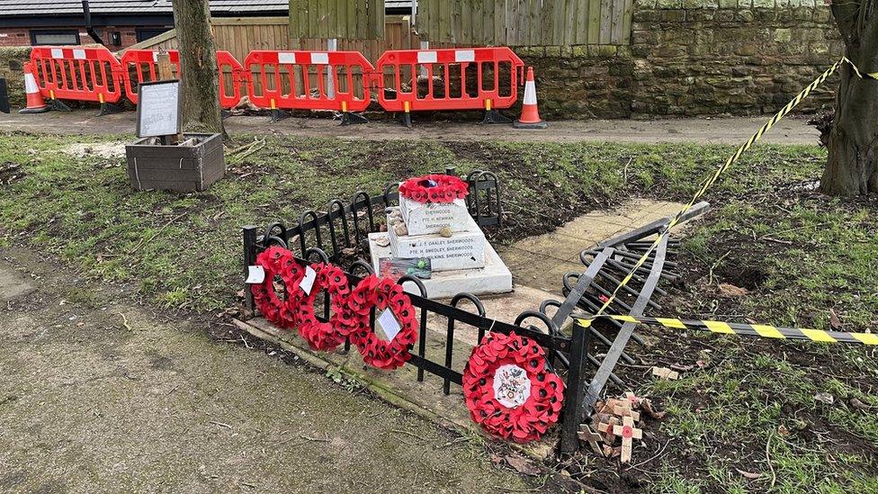 Damaged war memorial