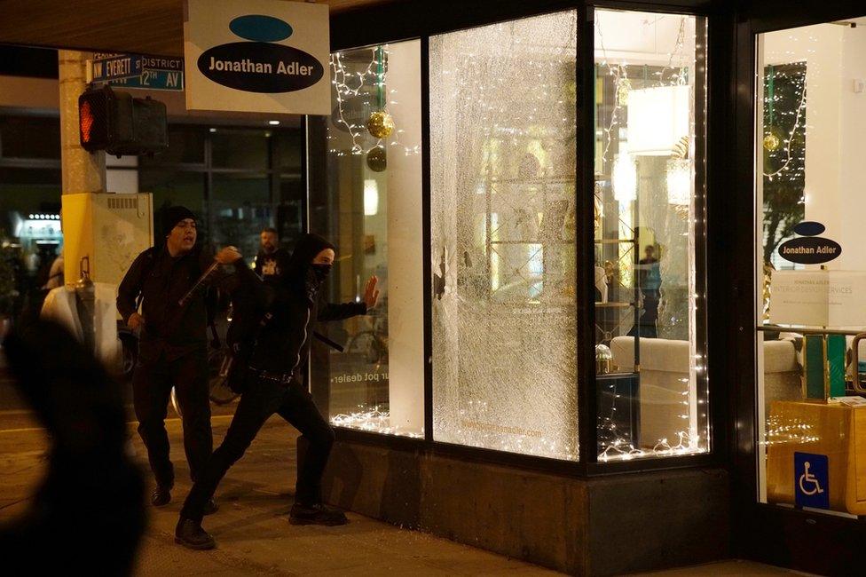 Damaged shop window in Portland, Oregon, 10 November