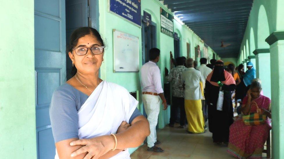 Kathija standing in her clinic